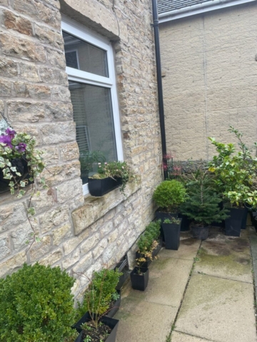 Front garden of a 2 bedroom property available to rent with The Lettings Cloud located on Spring Gardens Terrace, Padiham