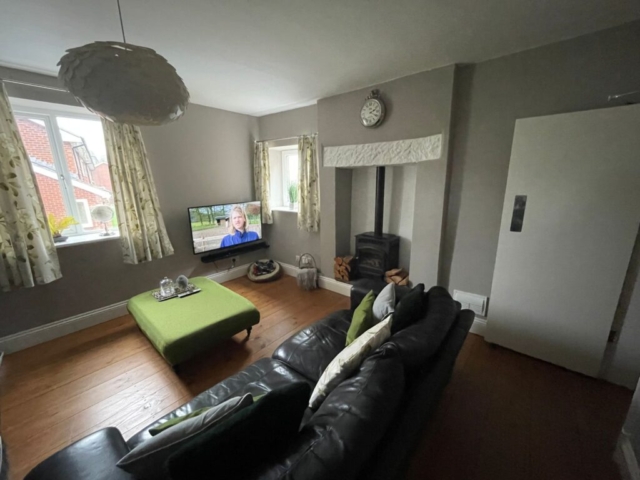 Living room of a 2 bedroom property available to rent with The Lettings Cloud located on Spring Gardens Terrace, Padiham